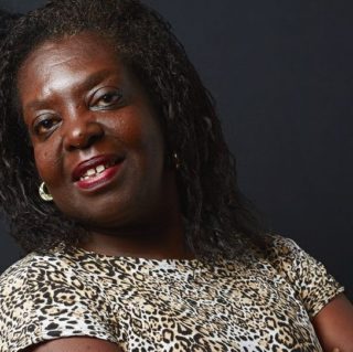 Emília Maria de Souza, leader in the Horto community, abutting the Botanical Gardens in Rio de Janeiro’s South Zone. Image by: Juan Couto.