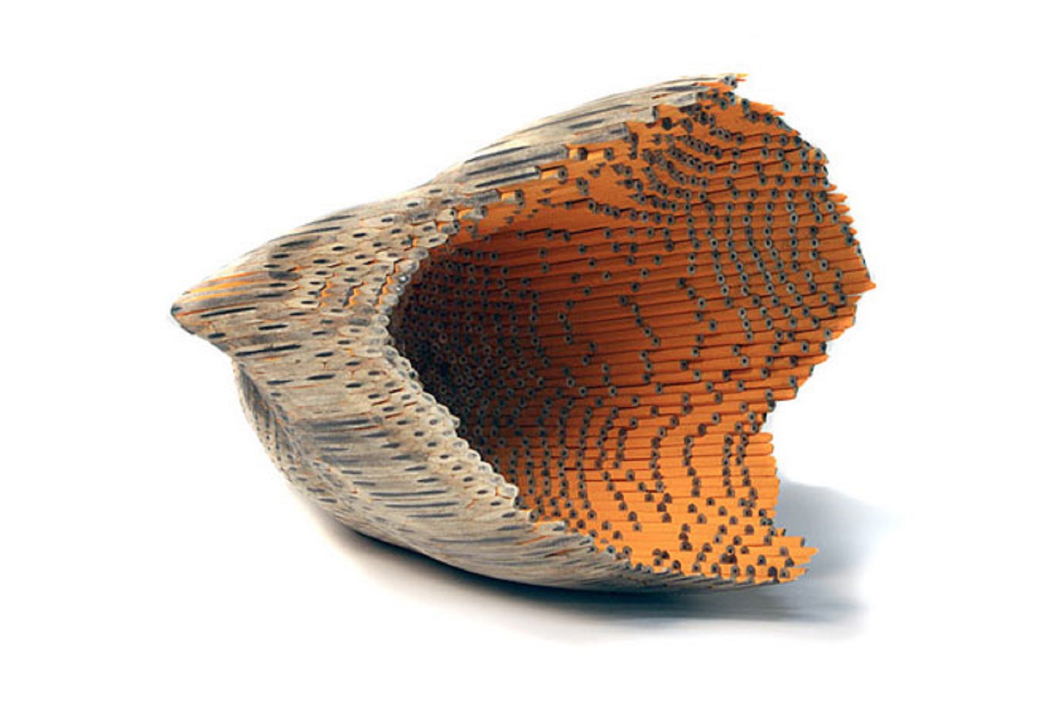 A photograph of a sculpture made out of pencils