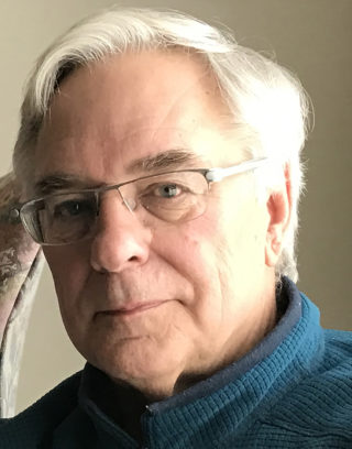 Headshot of George Thomas