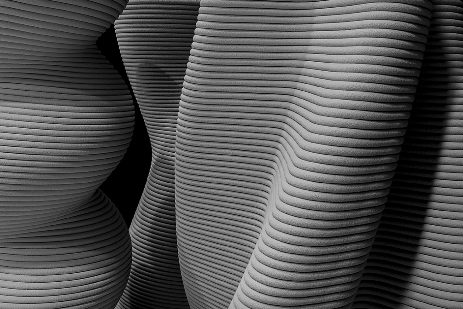 Closeup on the sculptural surface of 3D-printed concrete