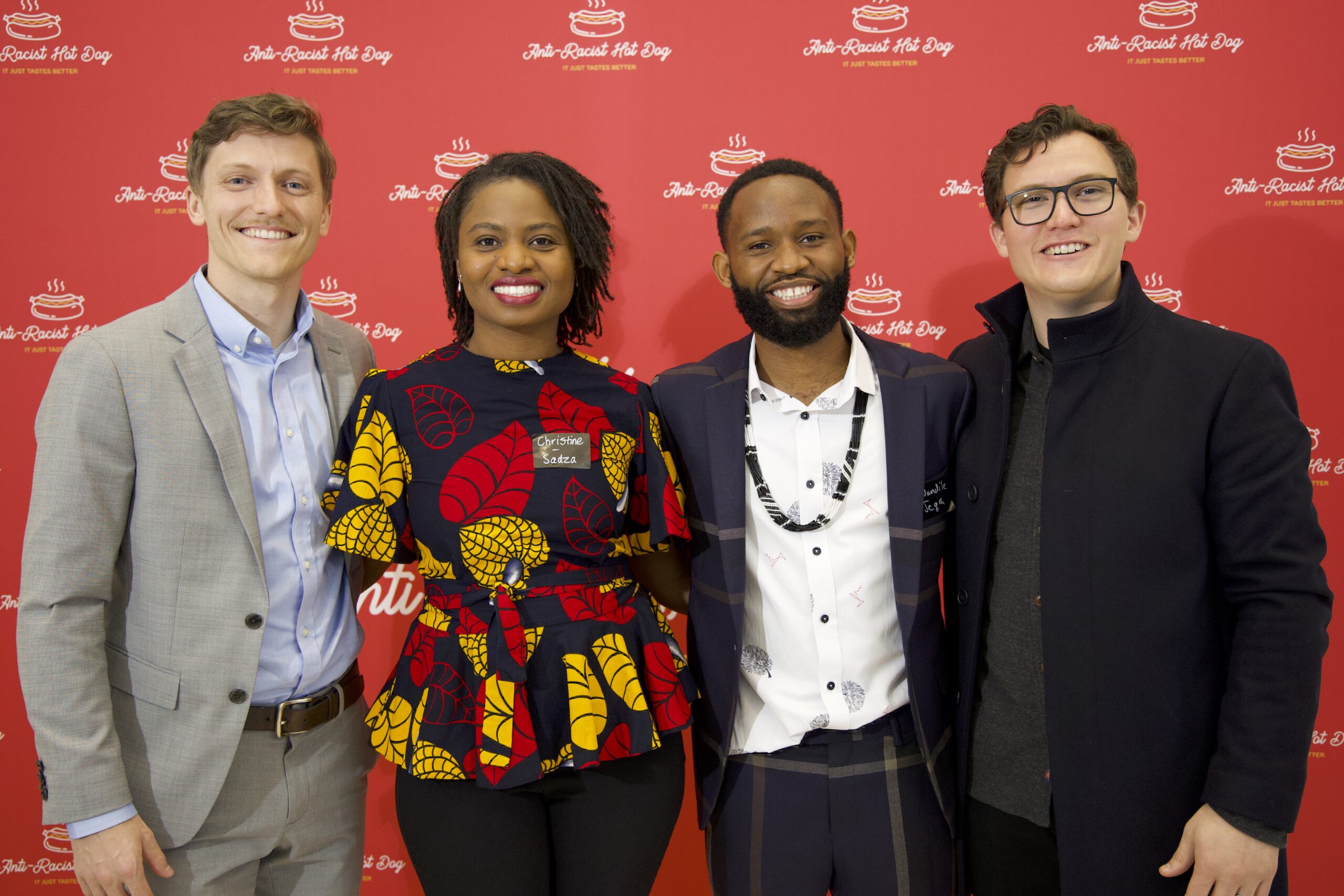 From left: Stephen Erich, Christine Mapondera, Wandile Mthiyane, and Josh Sanabria at a previous Anti-Racist Hot Dog event.