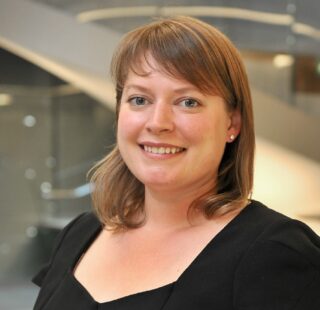 Headshot of Sevinc Yuksel, SVP and Head of Design and Construction, Rudin