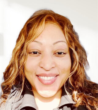 Heashot image of Sinade Wadsworth, NEW Graduate-Tradeswoman Co-Chair