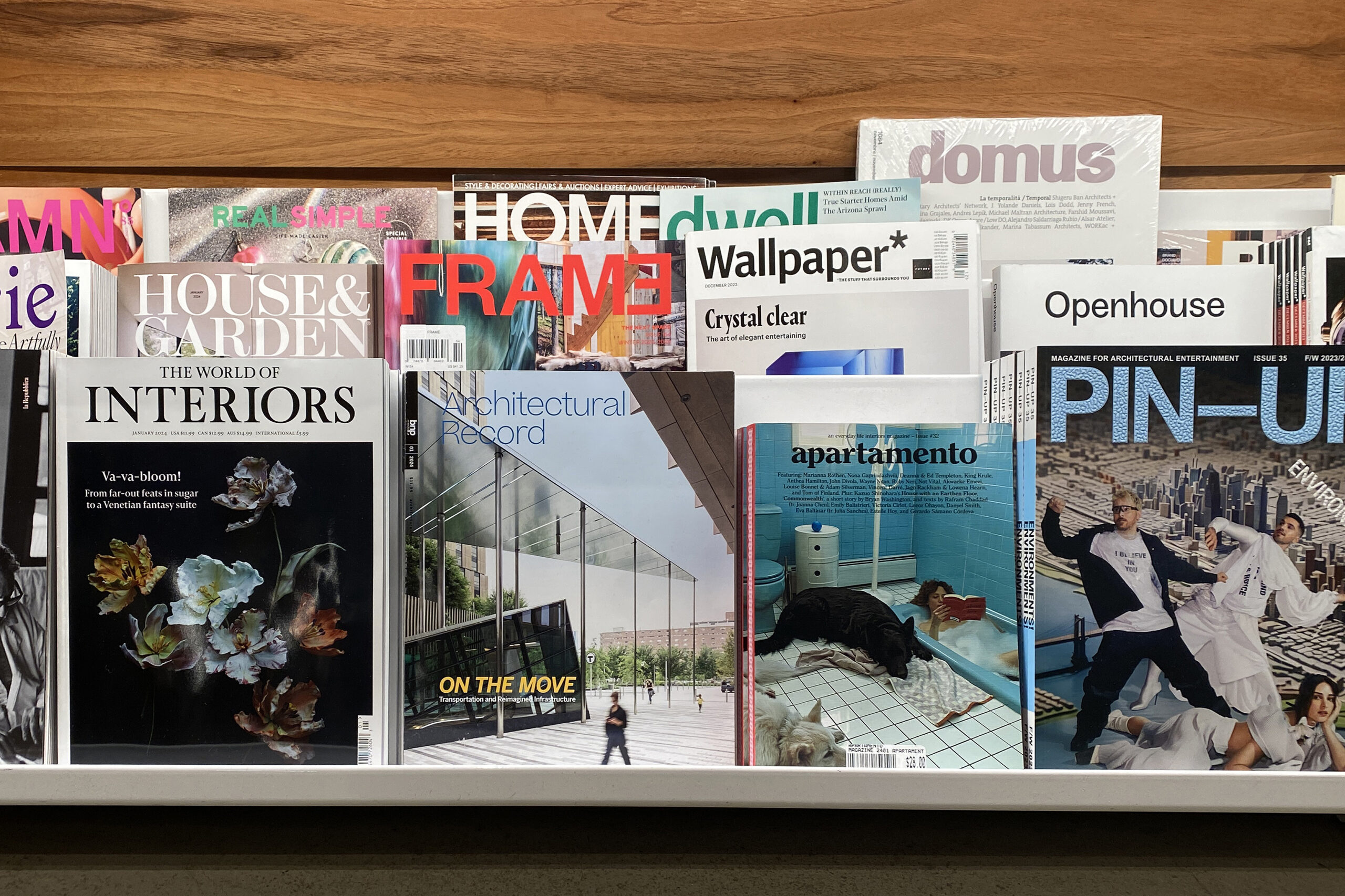 Image of Architecture magazines on a display shelf.