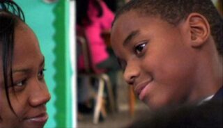 Tanika and Son in the film Mothers of Bedford