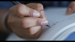 Anthony writing Photo: Resonant Pictures