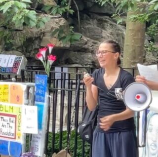 Jessica Semmel LMSW MST speaking at an outdoor event