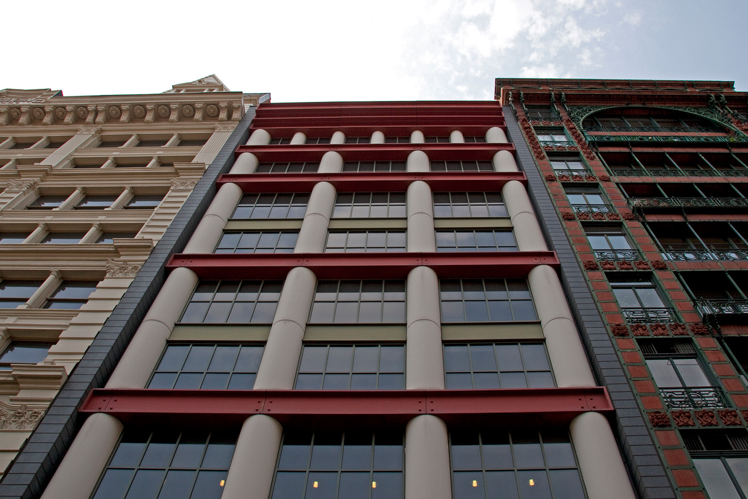 View looking up at the sky from the Scholastic Building.