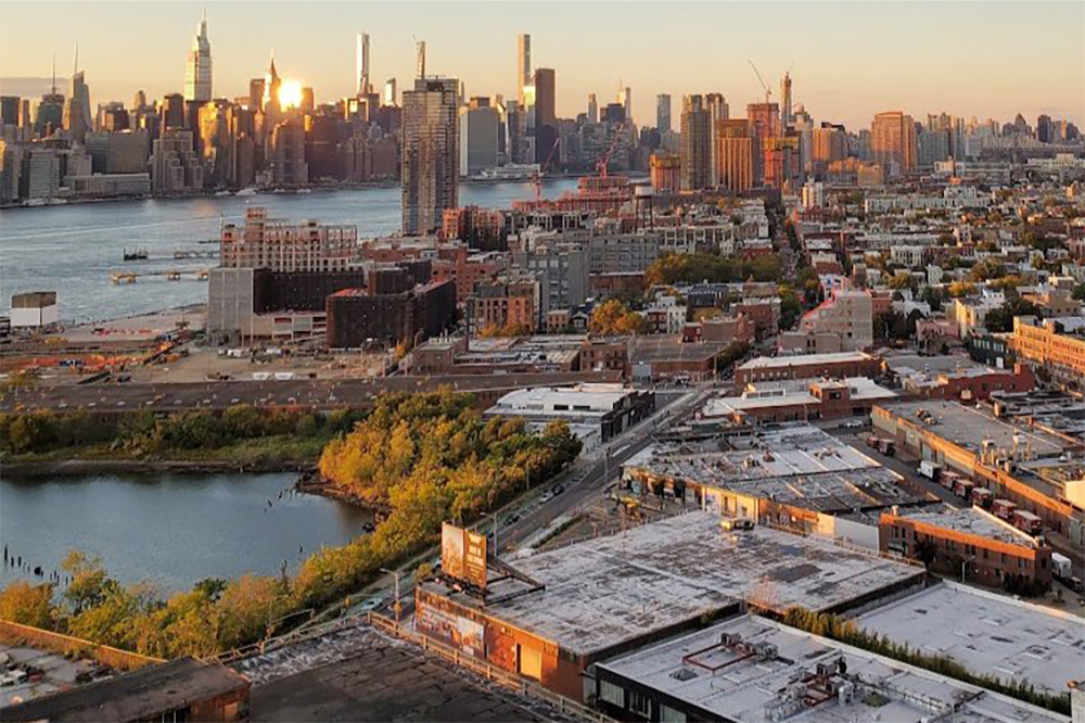 An aerial view of the New York City skyline at golden hour