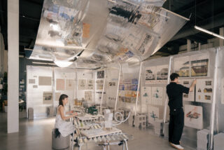 Interior image of Ekin Bilal and Celia Chaussabel working in the NOT NOT exhibition