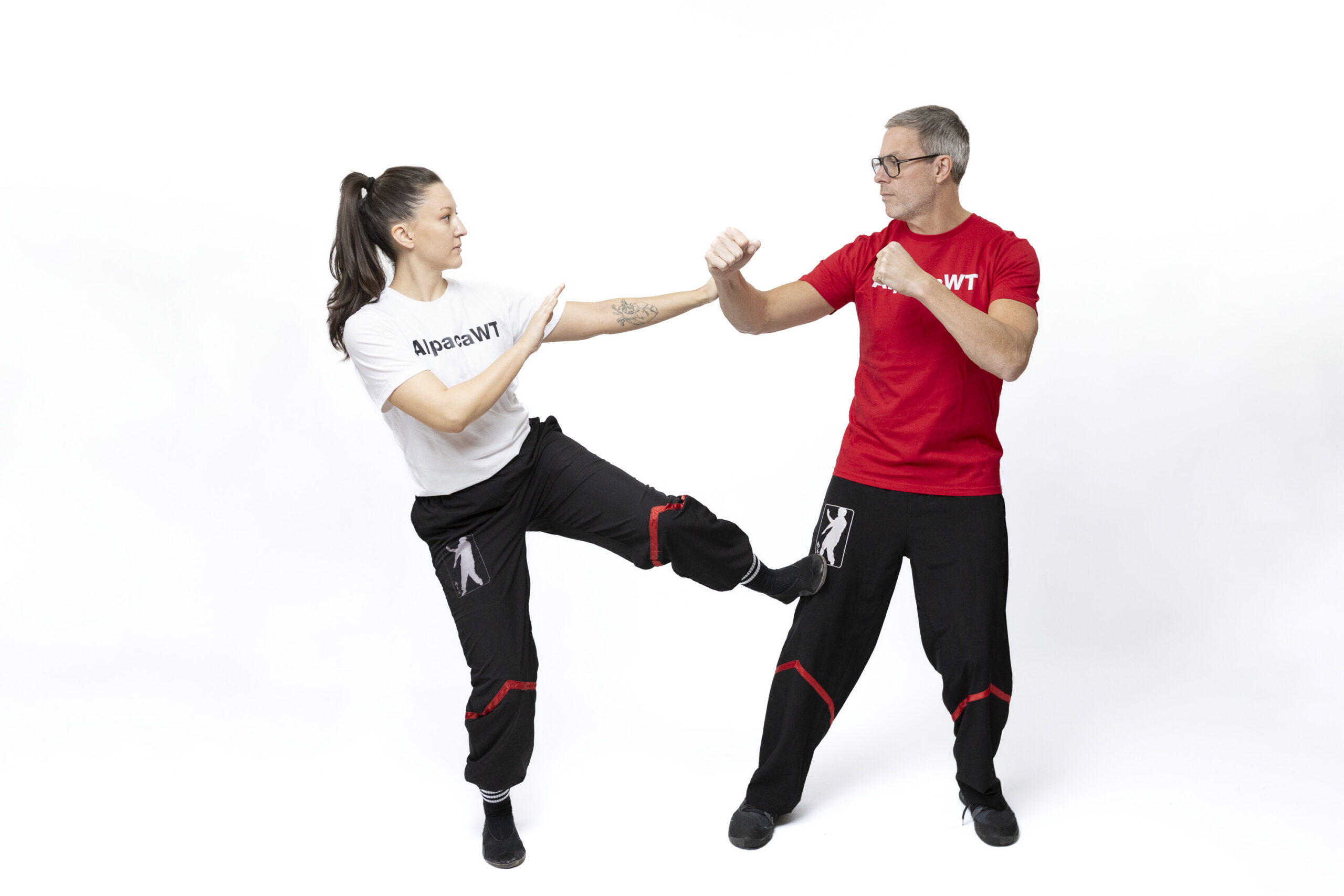 A man and woman sparring