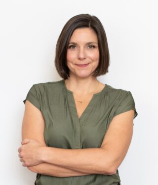 Headshot image of Kelley Tapia, AIA, WELL AP, LEED AP BD+C, FITWEL AMBASSADOR, TRUE ADVISOR, Sustainability Architect, Samskara Studio