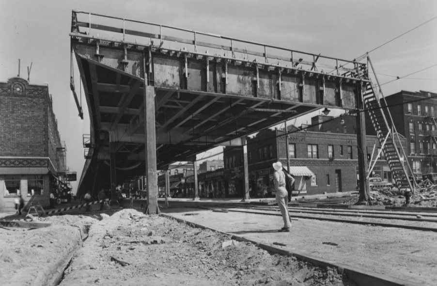 An archival photography of BQE construction progress through Red Hook, 1940s